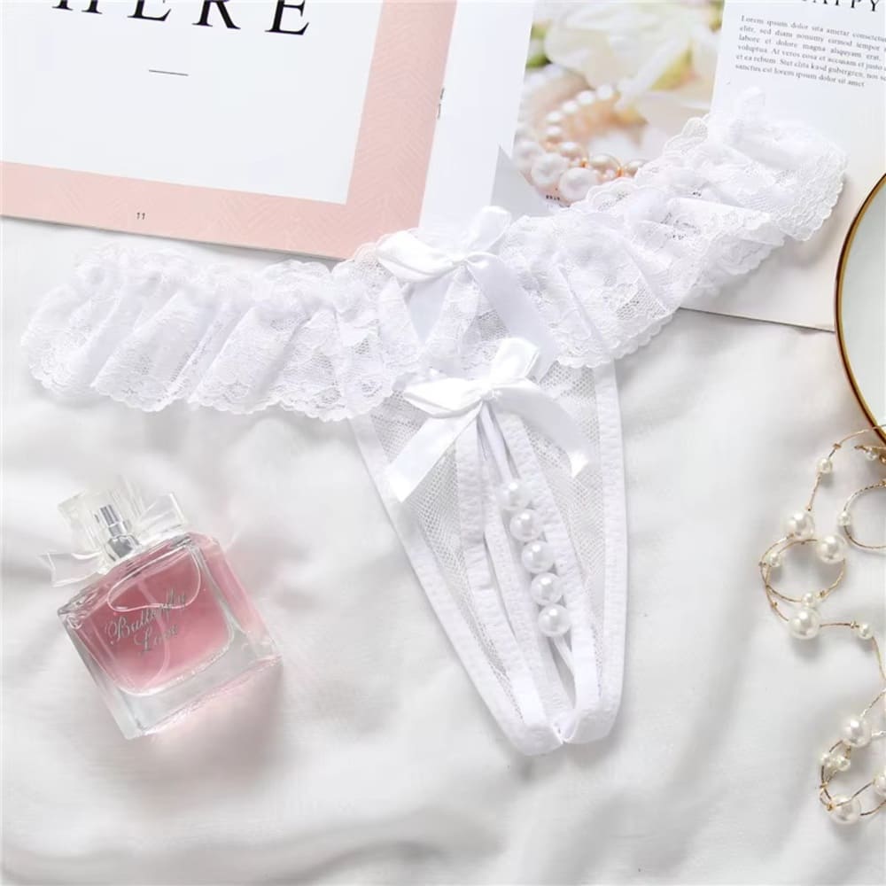 білі мереживні трусики з перлинками та відкритим дизайном